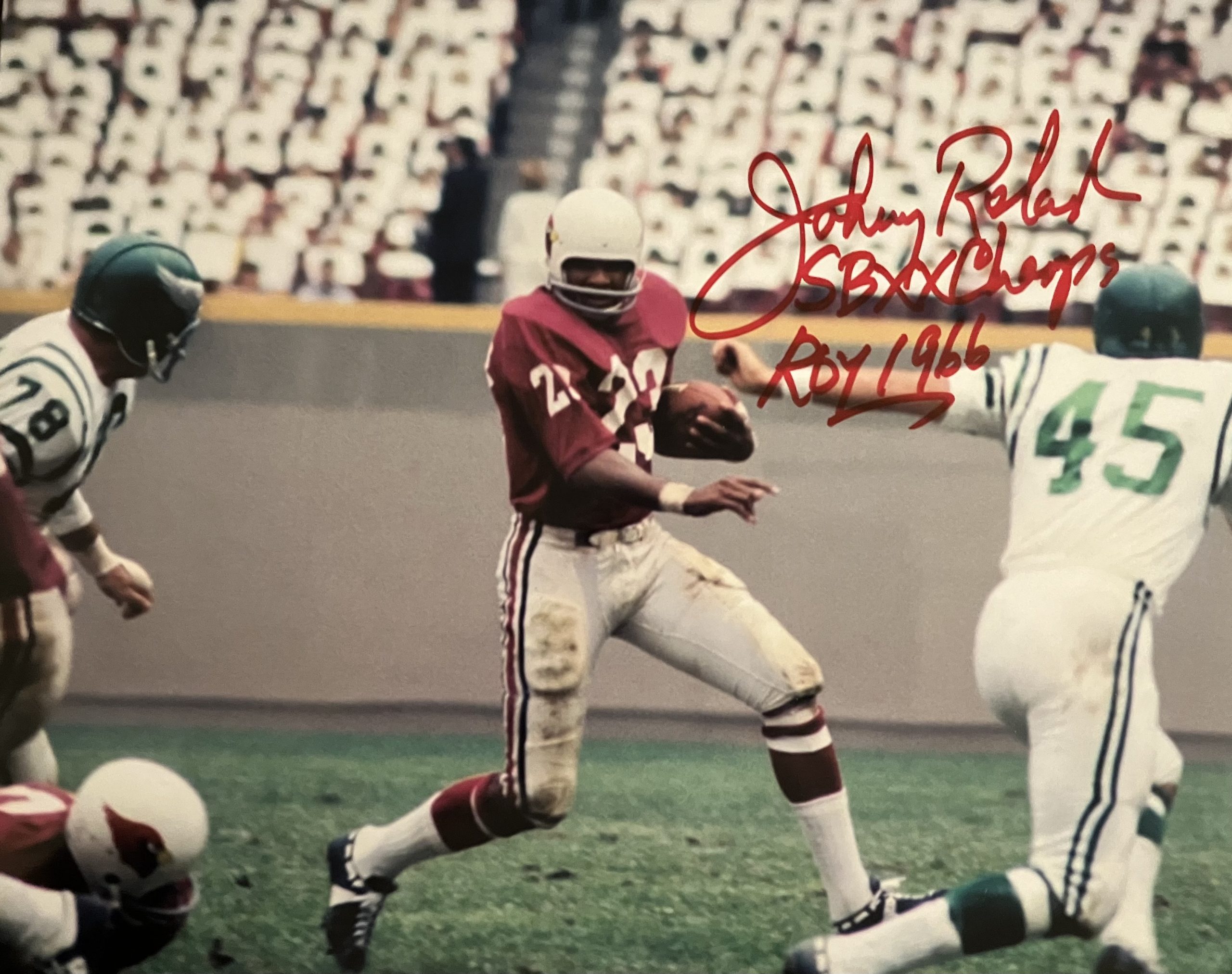 Johnny Roland Signed 8x10 w/66 ROY & SBXX Champ Insc.